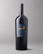 A bottle of 2018 The Estates Cabernet Sauvignon Oakville 1.5L on a grey background.