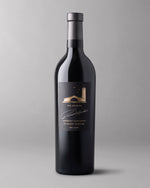 A bottle of 2018 To Kalon Reserve Cabernet Sauvignon on a grey background.