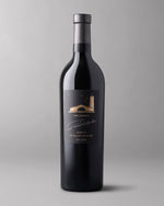 A bottle of 2021 Reserve Merlot To Kalon Vineyard on a light grey background