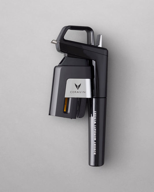 The Coravin Timeless Six+ with all accessories on a white background