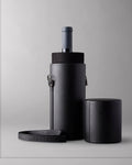 Single Bottle Wine Carrier made from vegan leather, with the  Arch & Tower embossed on the cap