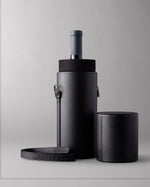 Single Bottle Wine Carrier made from vegan leather, with the  Arch & Tower embossed on the cap