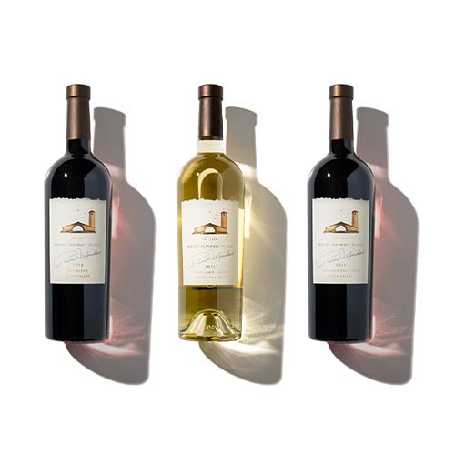 3 bottles of wine against a white background