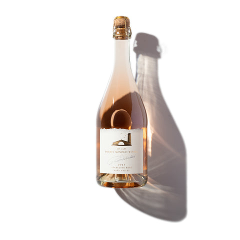 A bottle of 2021 Sparkling Rosé Napa Valley on a white background.